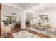 Open-concept layout featuring hardwood floors and seamless flow to living spaces at 2879 E Austin Dr, Gilbert, AZ 85296