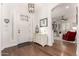 Bright foyer with hardwood floors, white trim, and stylish decor at 2879 E Austin Dr, Gilbert, AZ 85296