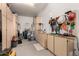 Well-organized garage featuring ample storage cabinets and a workbench with pegboard tool organization at 2879 E Austin Dr, Gilbert, AZ 85296