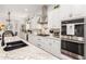 Bright kitchen with stainless steel appliances, granite counters, and sleek cabinetry at 2879 E Austin Dr, Gilbert, AZ 85296