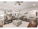 Open living space with hardwood floors, stylish furniture, and seamless kitchen access at 2879 E Austin Dr, Gilbert, AZ 85296