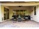 Charming covered patio with comfortable seating, ideal for enjoying the backyard view at 2879 E Austin Dr, Gilbert, AZ 85296