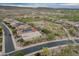 An elevated view shows the home's location within a desert golf course community at 31207 N 124Th Dr, Peoria, AZ 85383