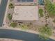 An aerial view of a home shows its roof, landscaping, and neighborhood at 31207 N 124Th Dr, Peoria, AZ 85383