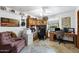 Comfortable home office with desk, cabinets, and an inviting armchair at 3160 E Fox St, Mesa, AZ 85213
