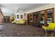 Covered patio with brick flooring, seating, and view of the pool at 3160 E Fox St, Mesa, AZ 85213