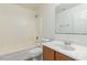 Clean bathroom featuring a shower-tub combination, toilet, and vanity with sink at 3221 W Alta Vista Rd, Phoenix, AZ 85041