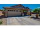Charming single-story home featuring a well-maintained lawn and attached two-car garage at 3221 W Alta Vista Rd, Phoenix, AZ 85041