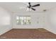 Cozy living room with large window at 3221 W Alta Vista Rd, Phoenix, AZ 85041
