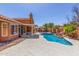 Enjoy the backyard retreat with pool, covered patio, gazebo and lush landscaping at 3424 E Harmony Ave, Mesa, AZ 85204