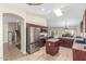 Kitchen with a center island and stainless steel refrigerator and appliances at 3424 E Harmony Ave, Mesa, AZ 85204