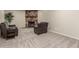 Inviting living room featuring a fireplace and comfortable seating, perfect for relaxation at 3424 E Harmony Ave, Mesa, AZ 85204