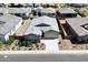 Charming aerial view of a home boasting manicured landscaping in a serene neighborhood at 3885 E Kenley Ln, San Tan Valley, AZ 85143