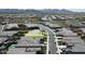 Aerial view of a neighborhood showcasing well-maintained homes and streets at 3885 E Kenley Ln, San Tan Valley, AZ 85143
