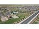 This photo highlights the community amenities: a park with a pool, playground, and basketball court at 3885 E Kenley Ln, San Tan Valley, AZ 85143