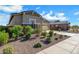 Landscaped front yard with gravel and diverse green shrubbery at 3885 E Kenley Ln, San Tan Valley, AZ 85143