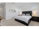 Inviting main bedroom featuring a large bed, plush carpeting, and stylish decor for a relaxing retreat at 3885 E Kenley Ln, San Tan Valley, AZ 85143