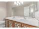 Bathroom featuring double sinks, decorative backsplash, and a large mirror at 4110 W Villa Linda Dr, Glendale, AZ 85310
