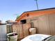 Fenced backyard featuring trash receptacles and an exterior home view at 4623 W Mission Ln, Glendale, AZ 85302