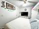 Cozy bedroom features ceiling fan, closet space and a neutral color palette at 4623 W Mission Ln, Glendale, AZ 85302