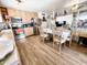 Charming kitchen features stainless appliances and wood cabinets and overlooks a dining area at 4623 W Mission Ln, Glendale, AZ 85302