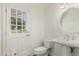Bathroom featuring checkered floor and white pedestal sink at 5118 E Mulberry Dr, Phoenix, AZ 85018