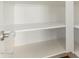 White shelves and brushed metal hardware at 5118 E Mulberry Dr, Phoenix, AZ 85018