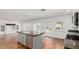 Kitchen island with stainless steel appliances and granite countertops at 5118 E Mulberry Dr, Phoenix, AZ 85018