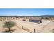 High-angle view of a home surrounded by open desert land, promoting seclusion at 52680 W Meadow Green Rd, Maricopa, AZ 85139