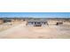 Wide aerial view showcasing a home with generous land, ideal for outdoor activities at 52680 W Meadow Green Rd, Maricopa, AZ 85139