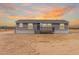 Charming single-story home with desert landscaping and a welcoming porch at 52680 W Meadow Green Rd, Maricopa, AZ 85139