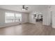 Bright living room with large windows and views of the surrounding scenery at 52680 W Meadow Green Rd, Maricopa, AZ 85139