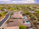 Desert community featuring homes with backyard pools, lush trees, and desert landscaping with majestic mountain views at 5428 E Windstone Trl, Cave Creek, AZ 85331