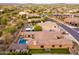 Lush desert community featuring backyard pools, and mature trees nestled among beautiful homes with mountain views at 5428 E Windstone Trl, Cave Creek, AZ 85331