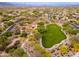 Beautiful aerial view of a Primary-planned community with green spaces and walking trails at 5428 E Windstone Trl, Cave Creek, AZ 85331