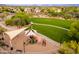 Community playground seen from above featuring desert landscaping, covered seating and play area at 5428 E Windstone Trl, Cave Creek, AZ 85331