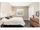 Bedroom with sleek wood floors, neutral walls, large window and built-in cabinets at 5428 E Windstone Trl, Cave Creek, AZ 85331