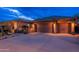 Charming home featuring a three-car garage, low maintenance landscape, and desert-friendly design at 5428 E Windstone Trl, Cave Creek, AZ 85331