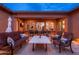 Large covered patio with comfortable seating and an outdoor dining area that's perfect for entertaining at 5428 E Windstone Trl, Cave Creek, AZ 85331