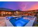 This home features a luxurious outdoor area with a sparkling pool, spa, and covered patio with comfortable seating at 5428 E Windstone Trl, Cave Creek, AZ 85331