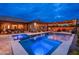 Beautiful backyard with a sparkling pool and spa, perfect for relaxation and outdoor gatherings at 5428 E Windstone Trl, Cave Creek, AZ 85331