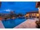 Backyard with a sparkling pool, spa, and patio, perfect for relaxation and enjoying outdoor living at 5428 E Windstone Trl, Cave Creek, AZ 85331