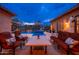 Beautiful backyard featuring a pool, spa, patio, and seating area, perfect for outdoor living at 5428 E Windstone Trl, Cave Creek, AZ 85331
