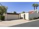 Charming home featuring a two-car garage, desert landscaping, and a tile roof at 5622 N Palacio Way, Phoenix, AZ 85014