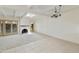 Bright living room with skylight, fireplace, and access to patio at 5622 N Palacio Way, Phoenix, AZ 85014