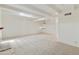 Bright living room with skylight, fireplace, and tile flooring at 5622 N Palacio Way, Phoenix, AZ 85014