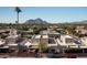 Expansive aerial view showcasing the community, with a mountain range in the backdrop at 5637 N 78Th Way, Scottsdale, AZ 85250