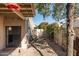A serene backyard setting showcasing a combination of hardscape and drought-tolerant plants for low maintenance appeal at 5637 N 78Th Way, Scottsdale, AZ 85250