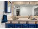 Bathroom featuring dual sinks, colorful tile accents, and ample counter space at 5637 N 78Th Way, Scottsdale, AZ 85250