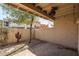 Cozy covered patio offers a cool shaded retreat, ideal for outdoor dining and entertaining with desert landscaping at 5637 N 78Th Way, Scottsdale, AZ 85250